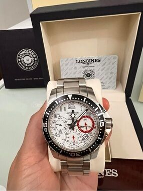 Longines Silver Steel Chronograph Watch with White Dial and Black Bezel
